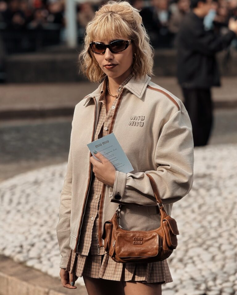 Alina Tsyganova at the Miu Miu show during Paris Fashion Week 2024.