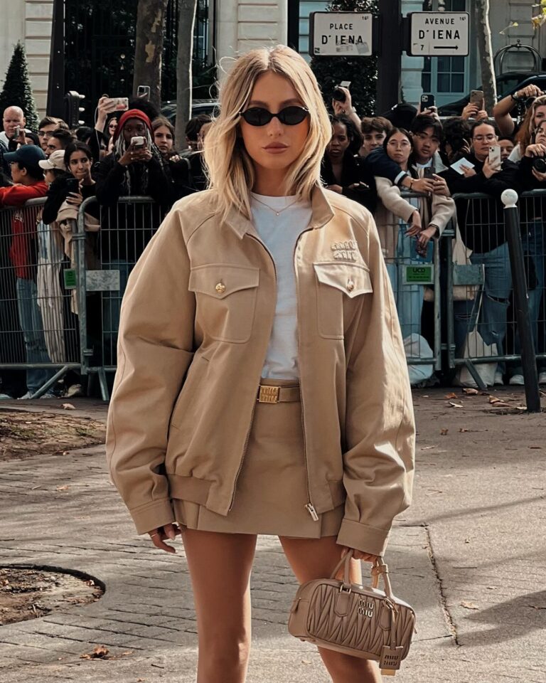 Alix Earle at the Miu Miu show during Paris Fashion Week 2023.