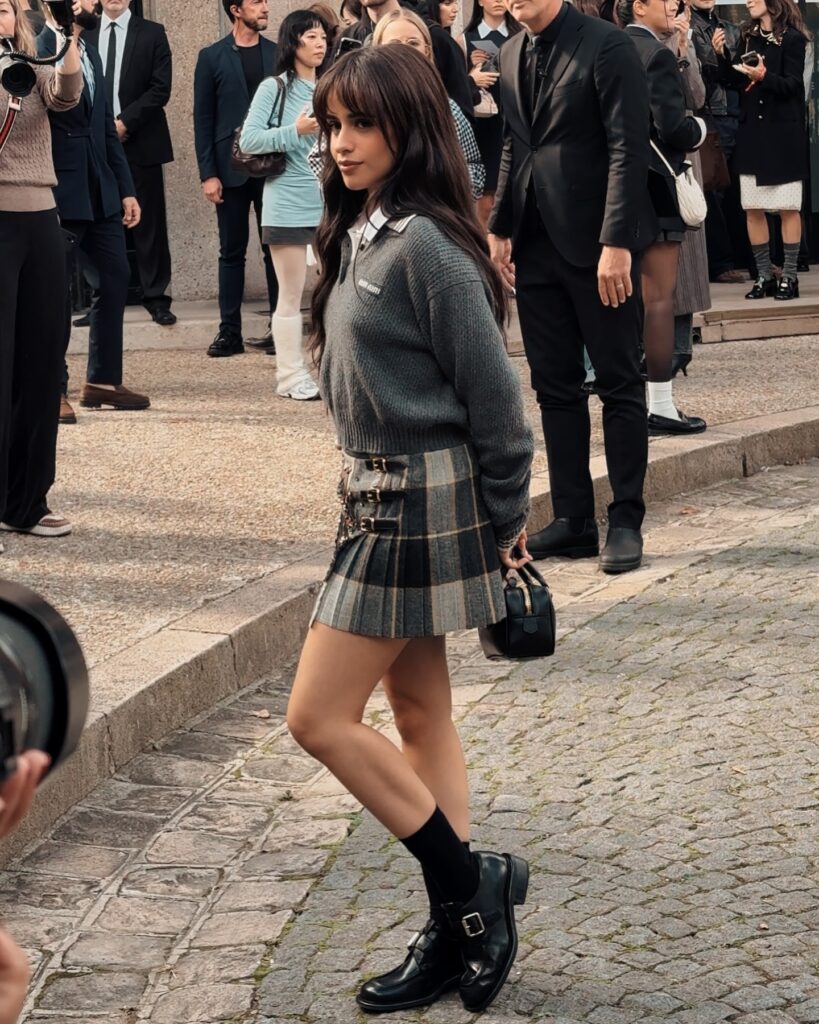 Camila Cabello at the Miu Miu show during Paris Fashion Week 2024.