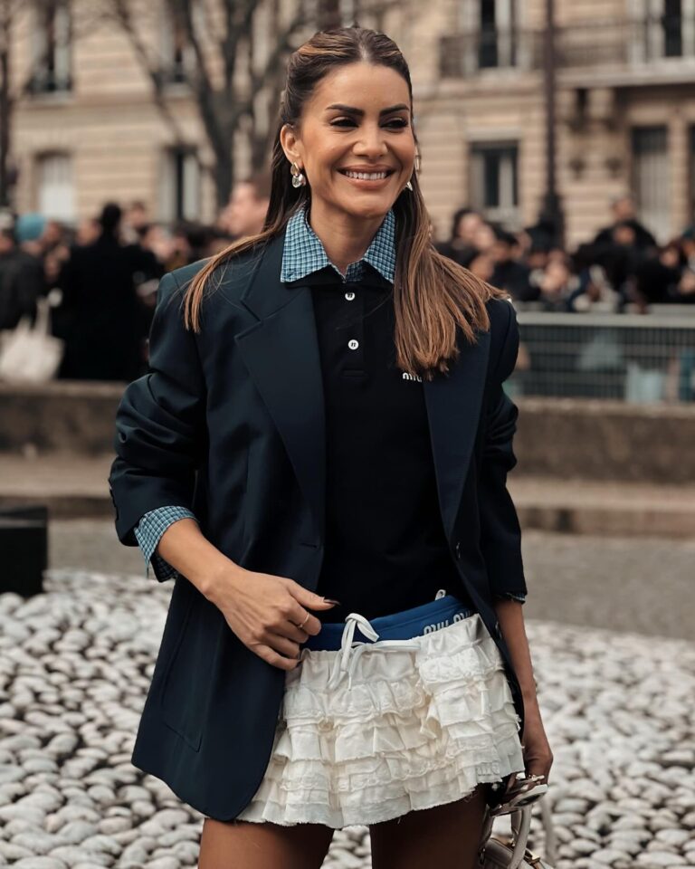 Camila Coelho at the Miu Miu show during Paris Fashion Week 2024.