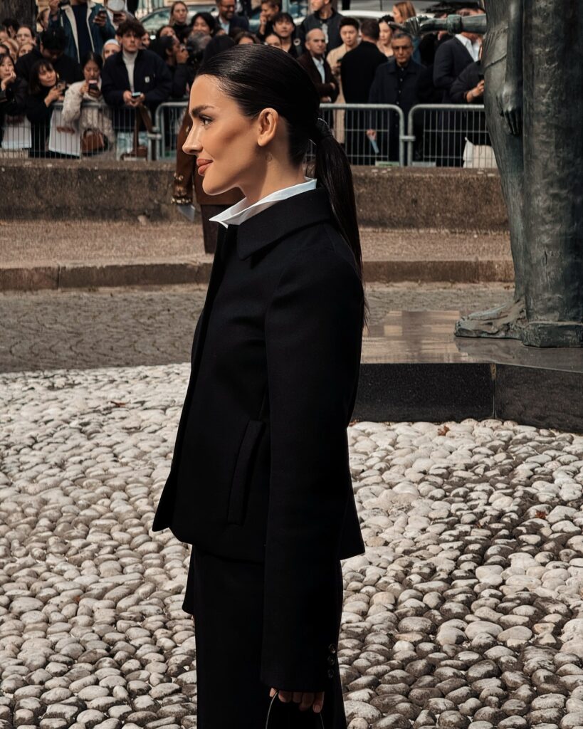 Dina Saeva at the Miu Miu show during Paris Fashion Week 2024.