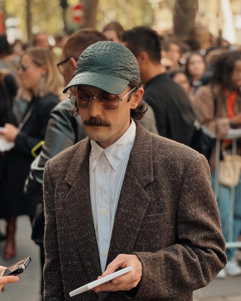 Guest at the Hermès show during Paris Fashion Week 2023.
