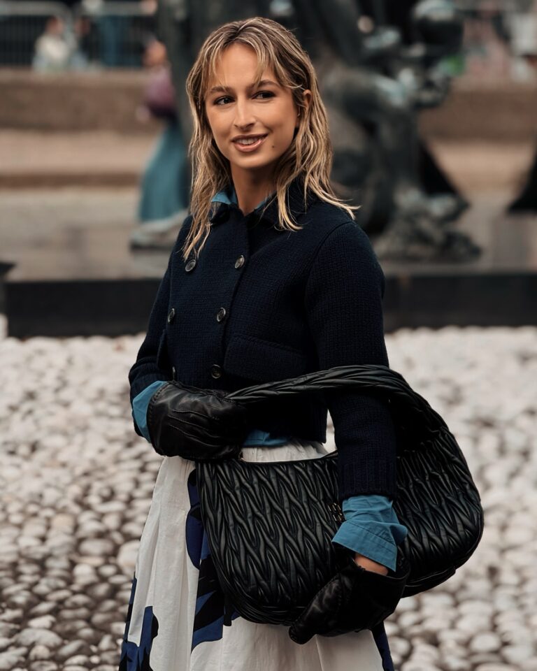 IZZI at the Miu Miu show during Paris Fashion Week 2024.