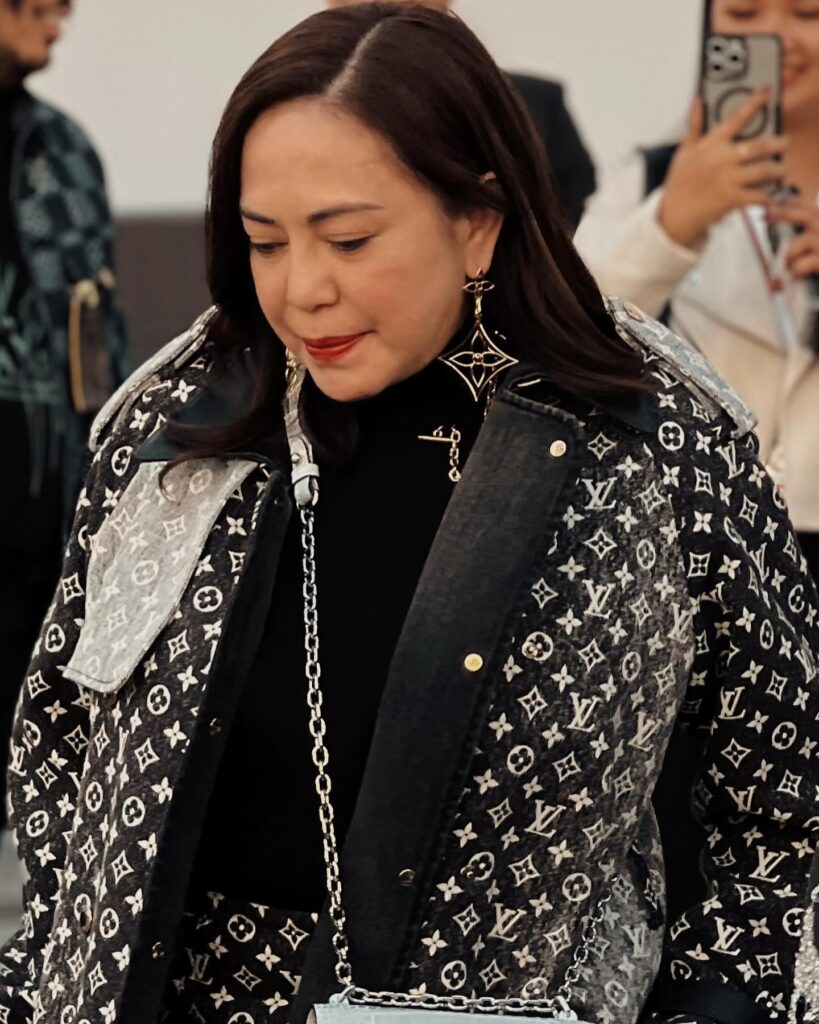 Guest at the Louis Vuitton show during Paris Fashion Week 2023.
