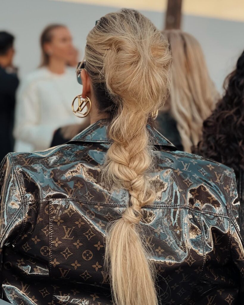 Guest at the Louis Vuitton show during Paris Fashion Week 2023.