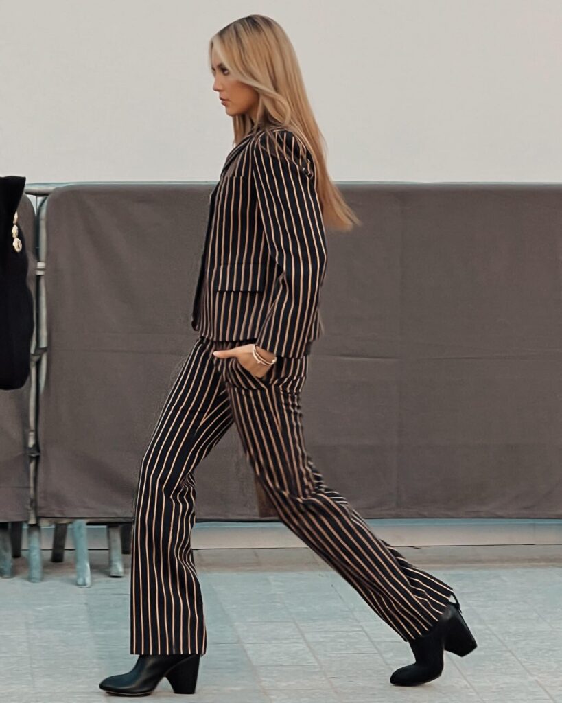 Guest at the Louis Vuitton show during Paris Fashion Week 2023.