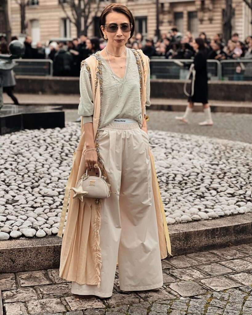 Guest at the Miu Miu show during Paris Fashion Week 2024.