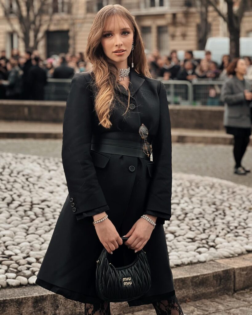 Guest at the Miu Miu show during Paris Fashion Week 2024.