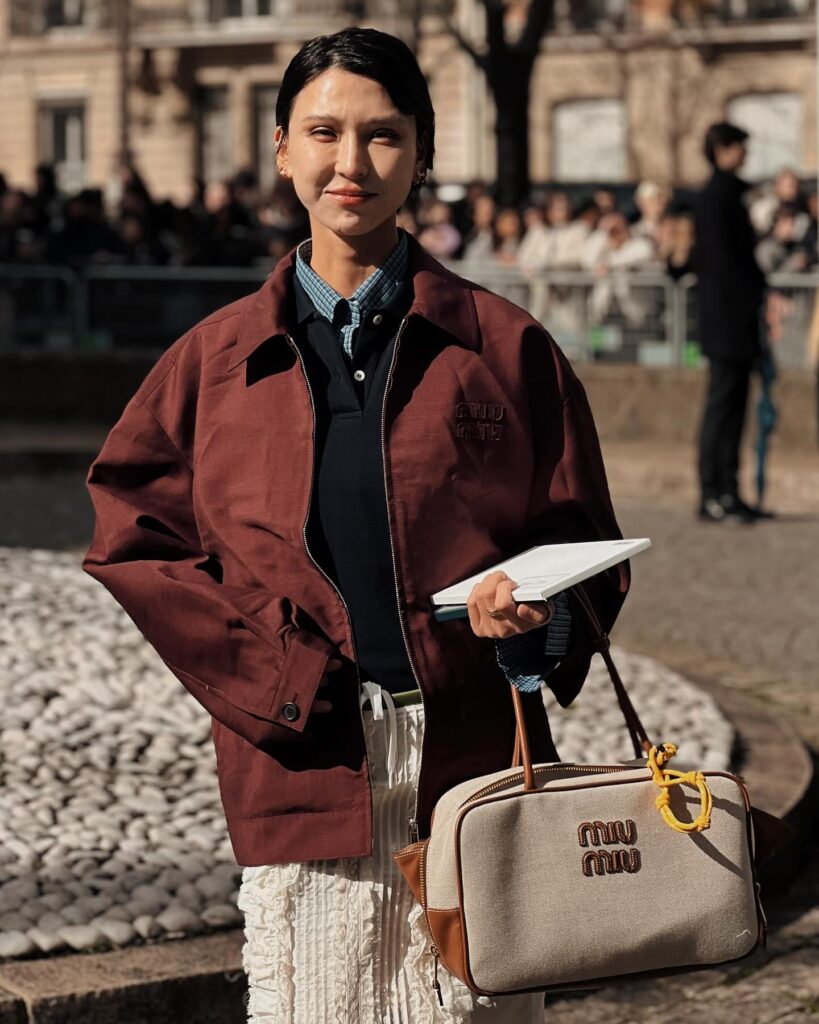 Guest at the Miu Miu show during Paris Fashion Week 2024.