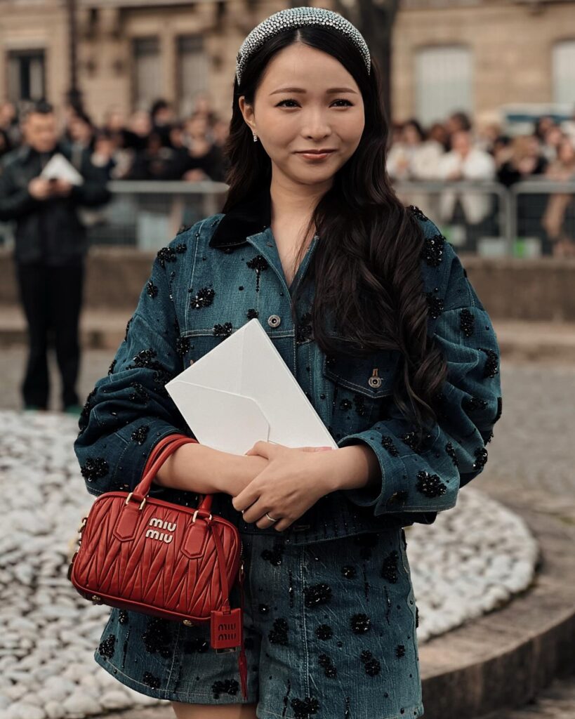 Guest at the Miu Miu show during Paris Fashion Week 2024.
