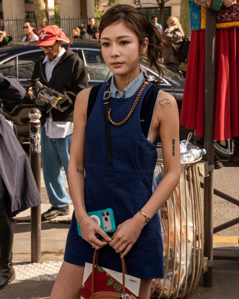 Guest at the Miu Miu show during Fashion Week in Paris 2026.