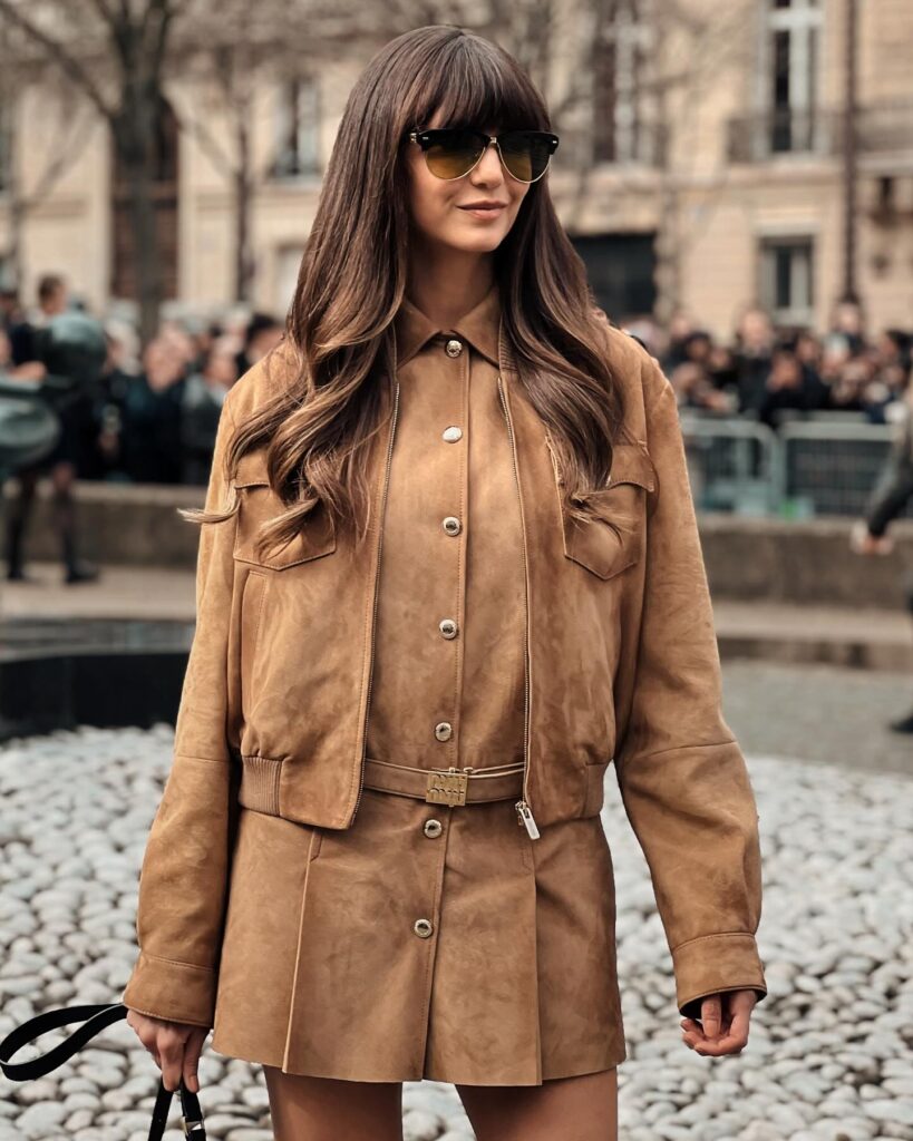 Nina Dobrev at the Miu Miu show during Paris Fashion Week 2024.
