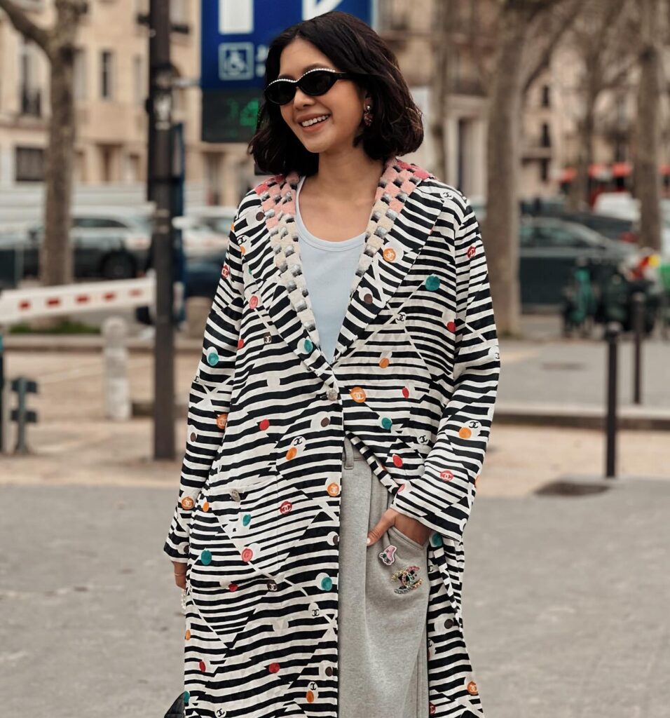 Proud Oranicha K. at the CHANEL show during Paris Fashion Week 2024.