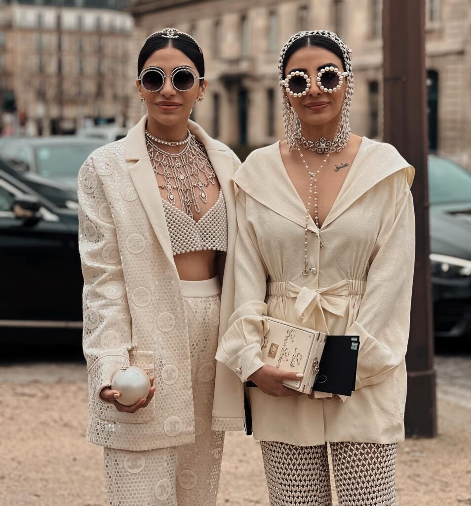 Snehal & Jyoti Babani at the CHANEL show during Paris Fashion Week 2024.