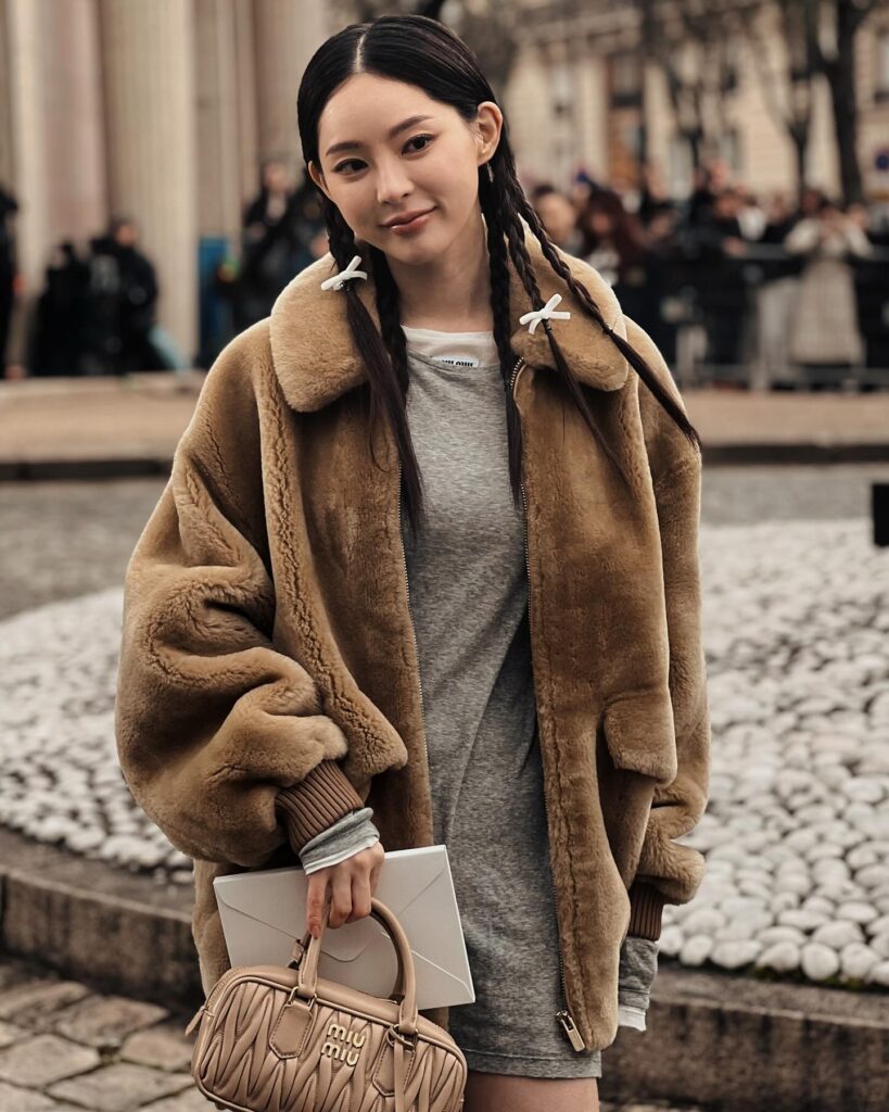 Song Sera at the Miu Miu show during Paris Fashion Week 2024.